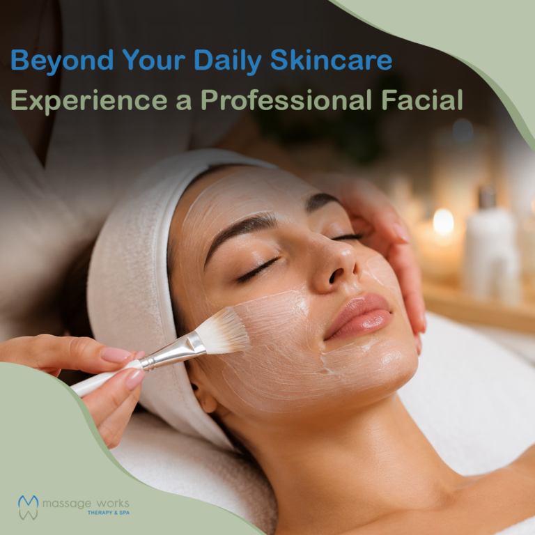 Professional facial treatment at Massage Works Therapy & Spa with an esthetician applying a facial mask to a client's skin.